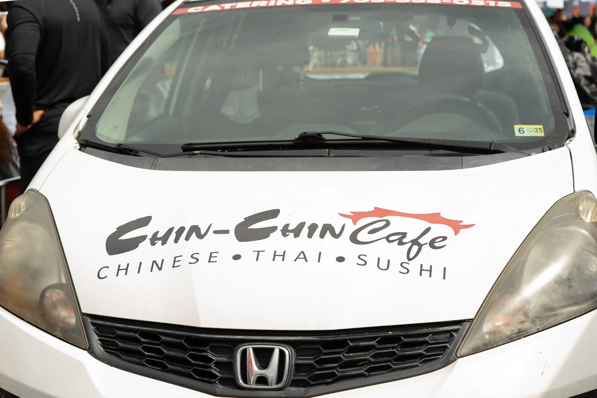 Chin-Chin Cafe’s Chinese, Thai and sushi catering car among the crowd at US Asian Fest